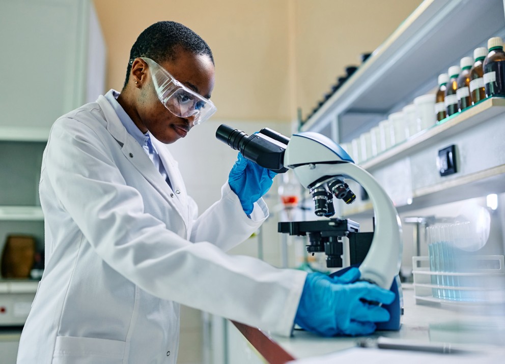 scientist with lab equipment