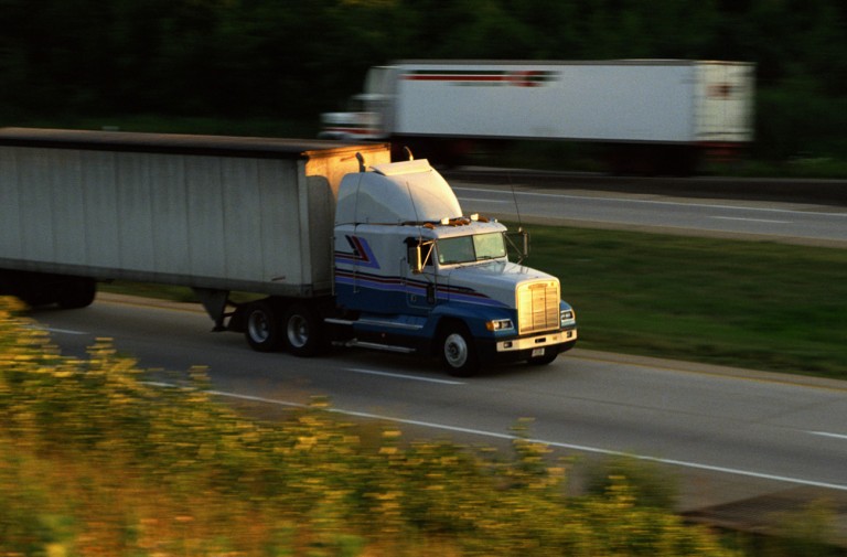https://www.riverridgecc.com/images/uploads/trucks-on-highway.jpg corner image